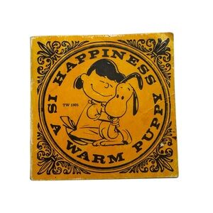 Happiness is a Warm Puppy by Charles Schulz Paperback VINTAGE Peanuts Book 1962
